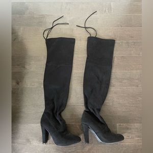 Black heeled thigh high boots